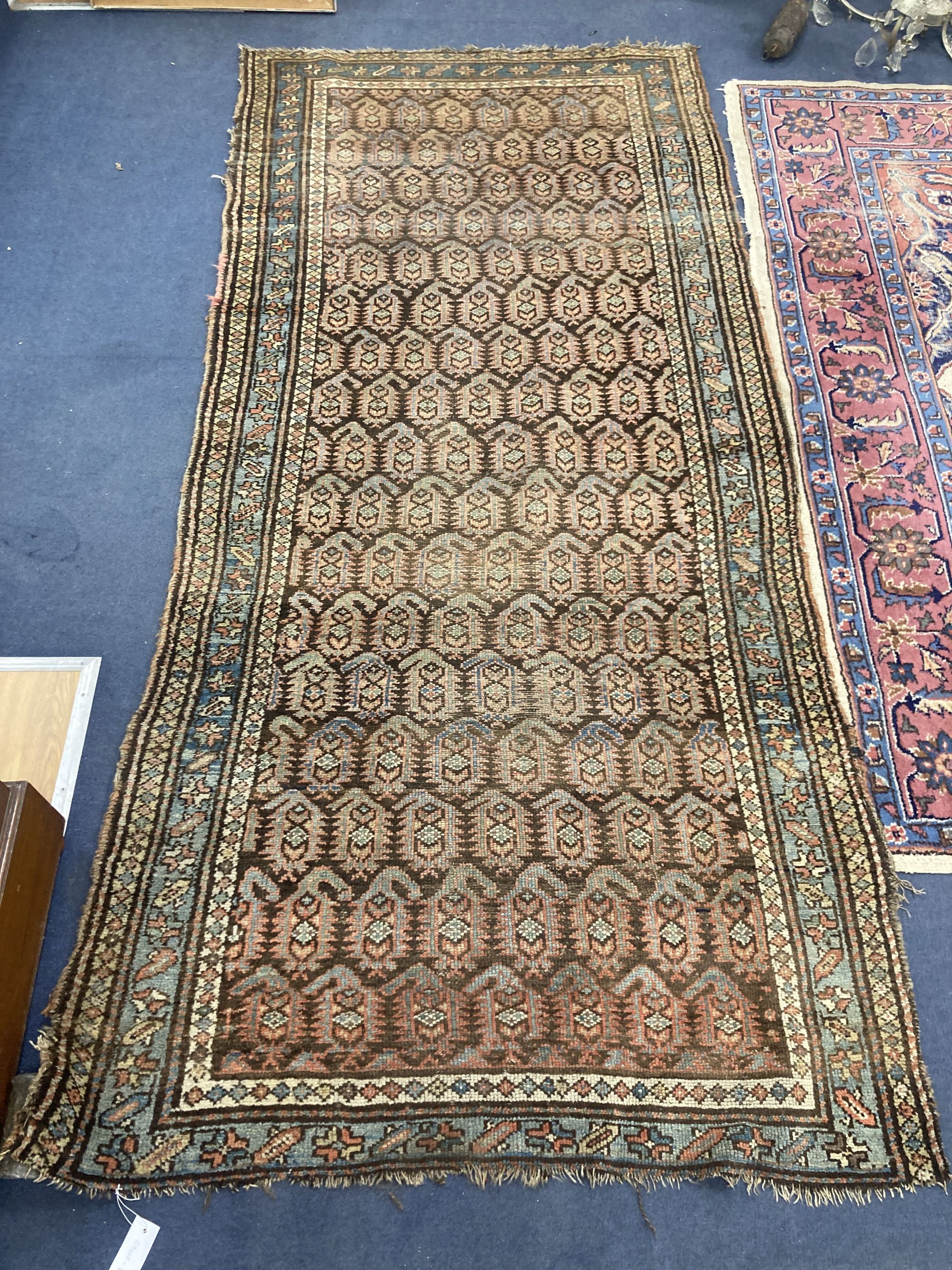 A Caucasian Boteh rug, 255 x 122cm